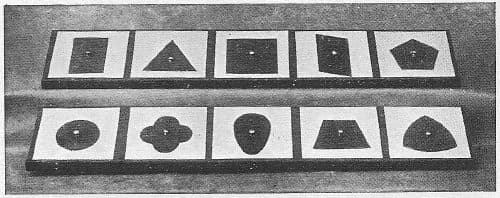 Montessori metal insets, ten frames on two sloping boards, Fig. 28 in Dr. Montessori's Own Handbook, 1914
