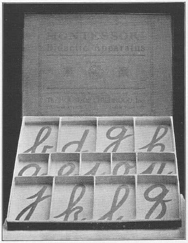 Montessori movable alphabet, cursive letters in a divided box, Fig. 31 in Dr. Montessori's Own Handbook, 1914